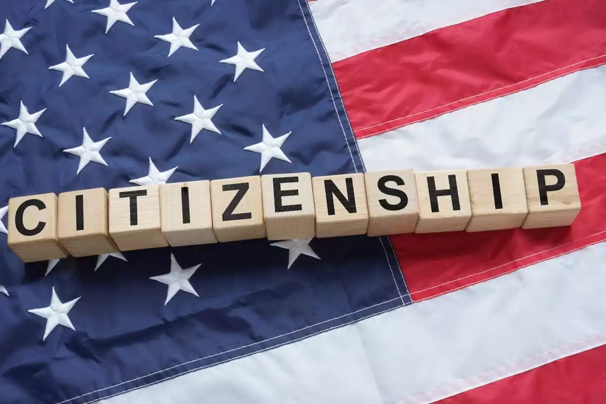 Citizenship written with blocks across and American flag