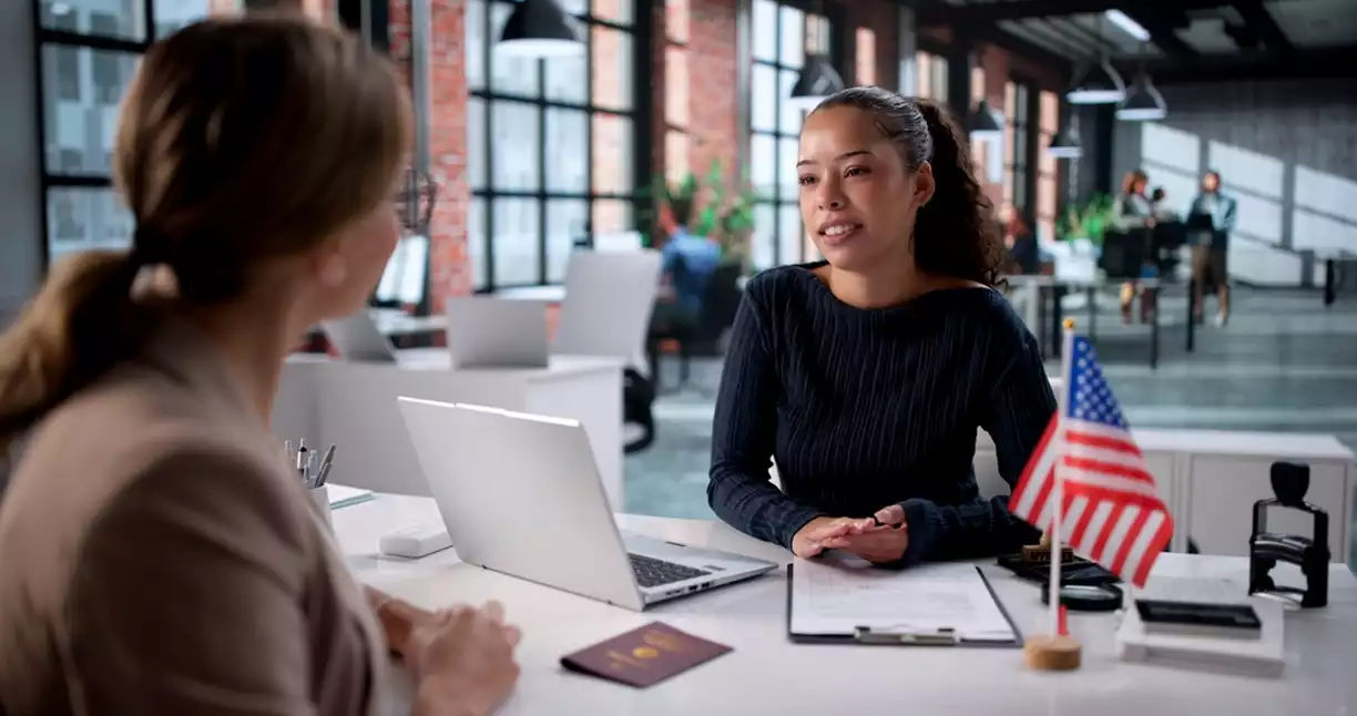 Nonimmigrant foreign national meets with an immigration attorney regarding US Visa extension options
